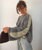 Pull gris à bandes jaune