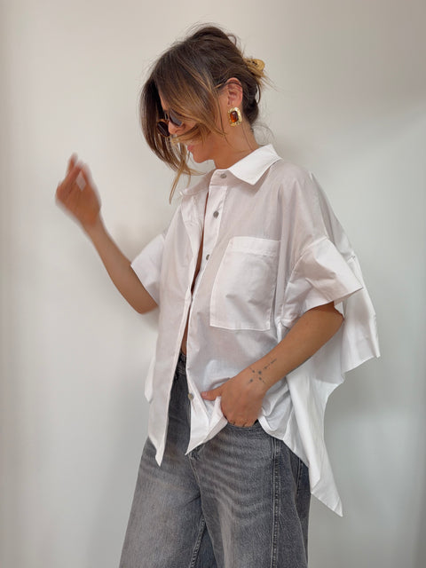 Chemise blanche dos nu